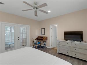 Guest bedroom with direct access to screened porch