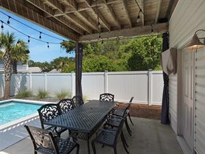 Covered eating area poolside