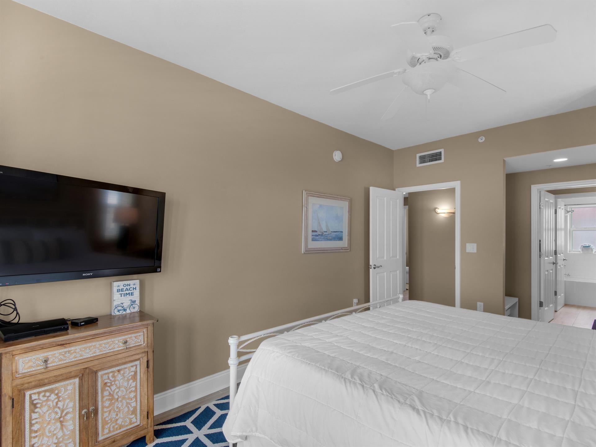 Guest Bedroom with Wallmounted TV
