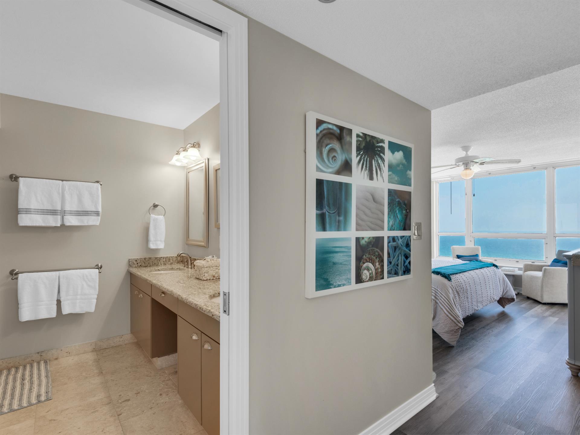 View of Primary bathroom and Primary bedroom from entryway