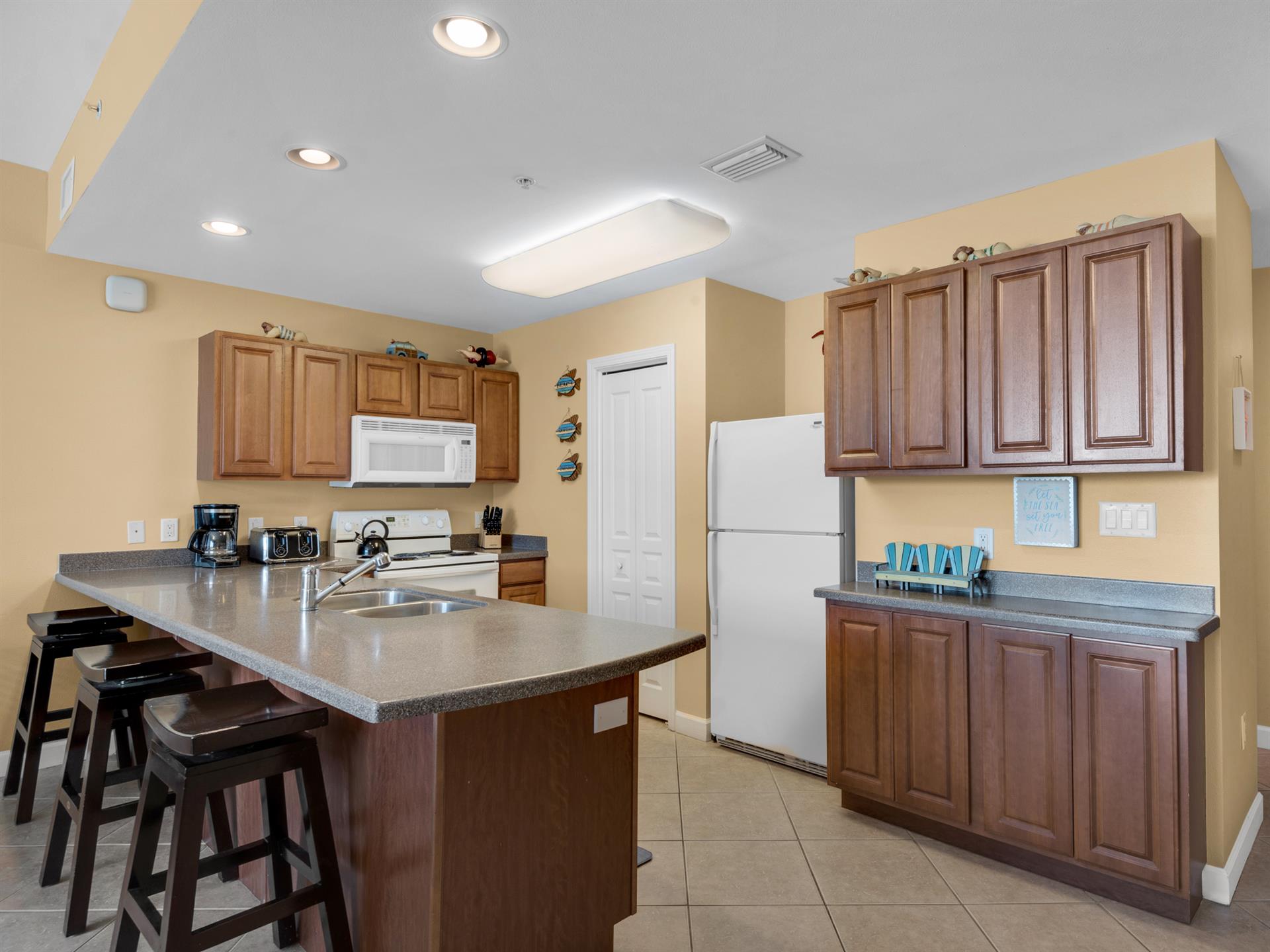 Large Open Kitchen with additional Breakfast Bar Seating