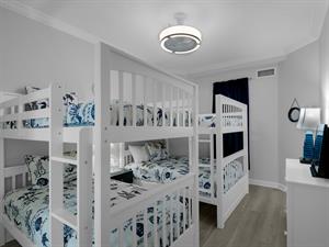 Bunk bedroom with 1 twin over twin bed and 1 double over double bed