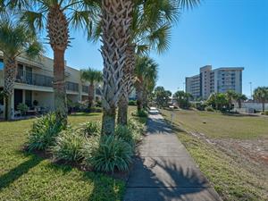 Courtyard walk way to beach and south pool area