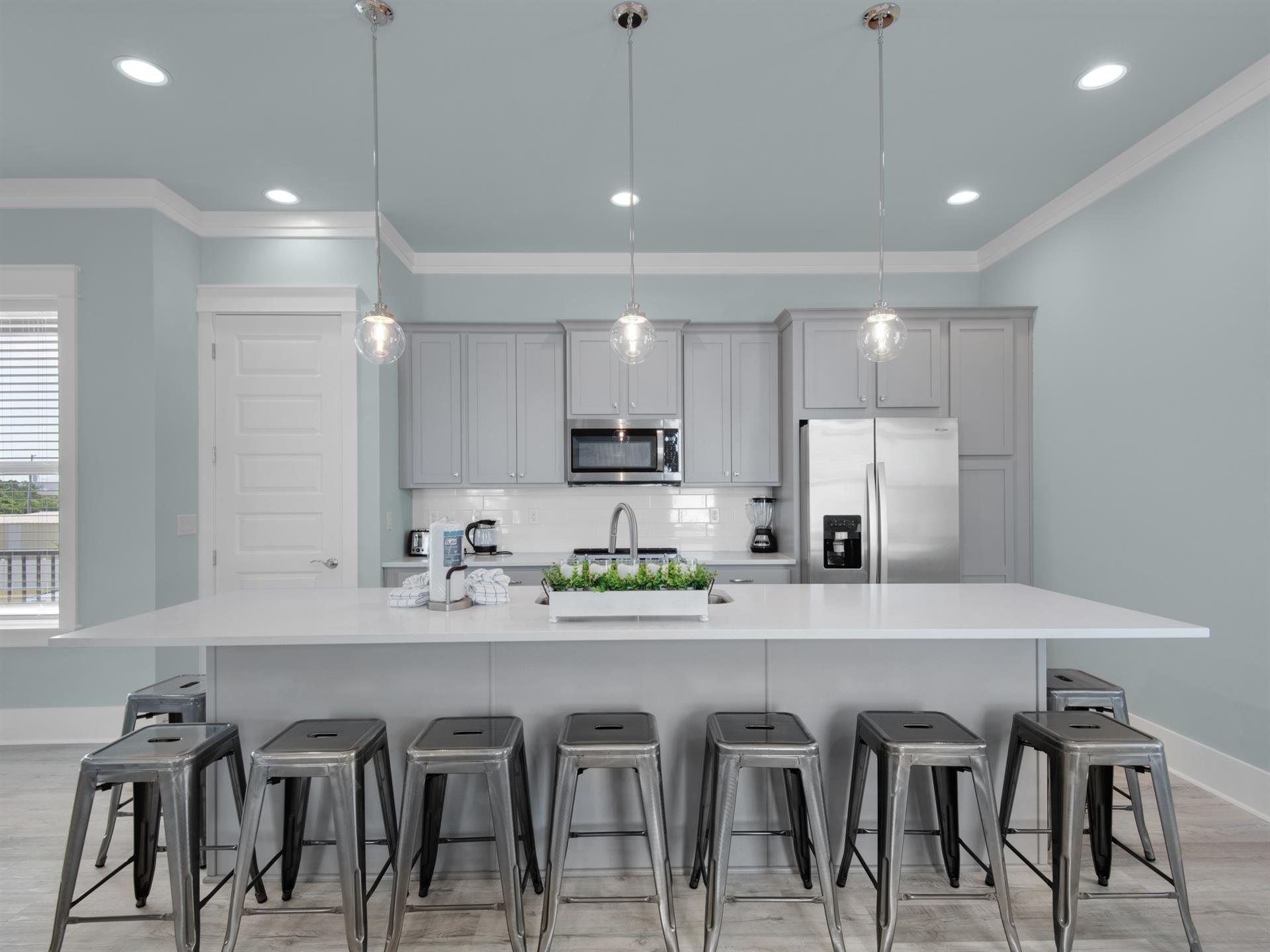 Kitchen with additional breakfast bar seating