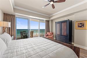 Maser Bedroom with King Bed and Access to Large Private Balcony