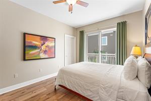 Guest Bedroom 3 with Queen Bed and Access to Private Balcony