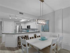 Dining area with additional seating at breakfast bar