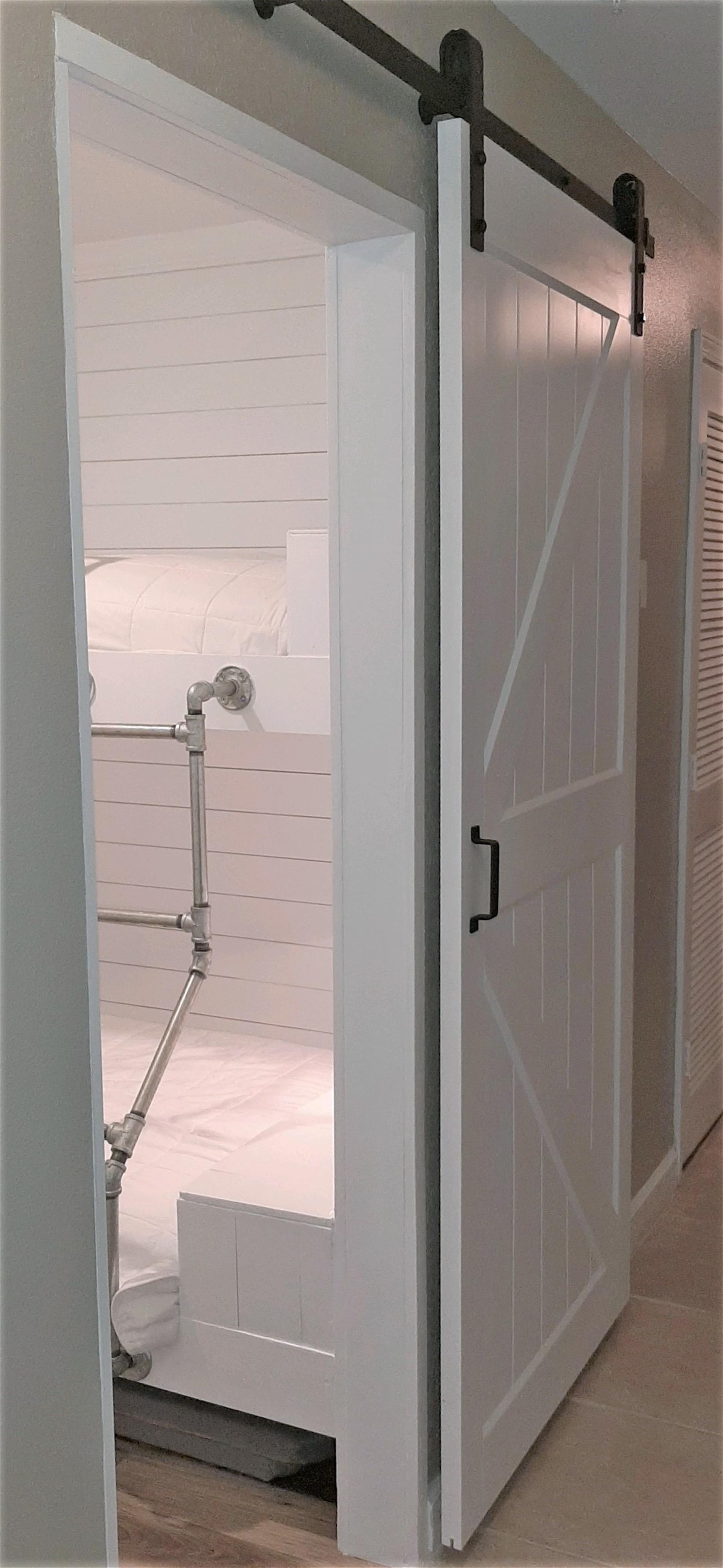 Bunk area with barndoor for privacy