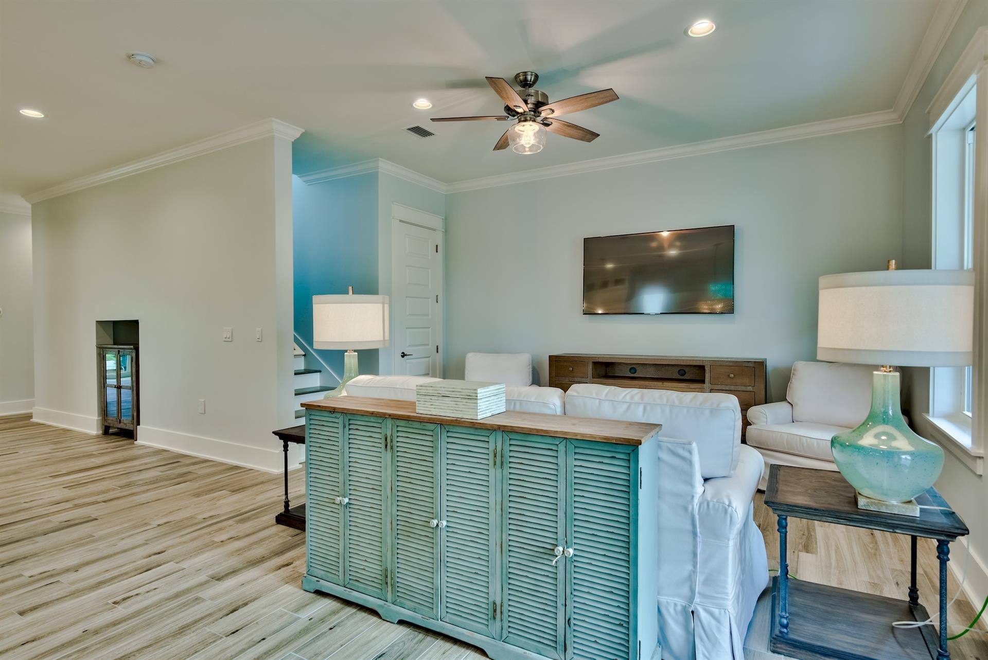 Living area with 85 TV new as of March 2022