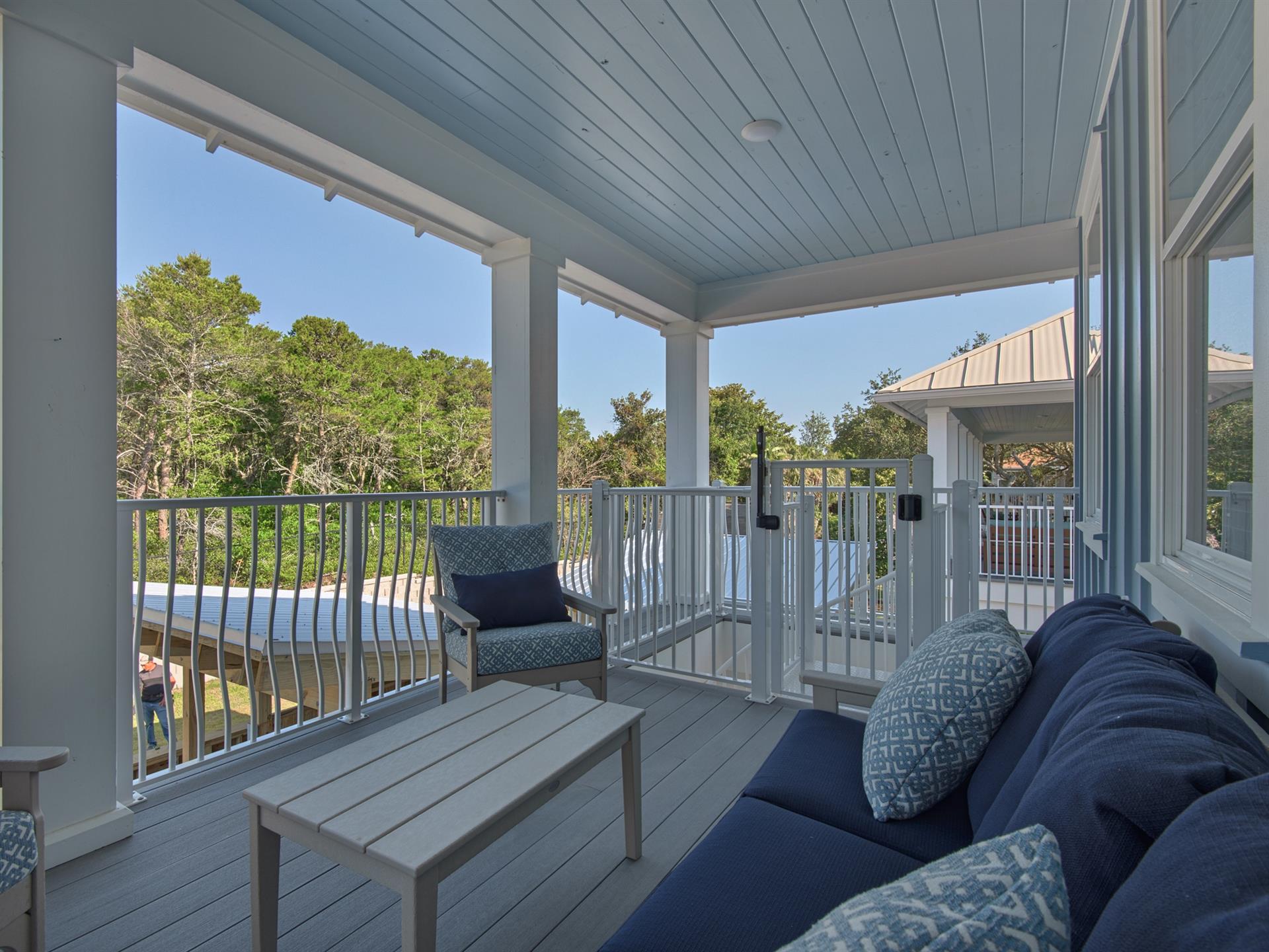 2nd Floor balcony with staircase to pool area