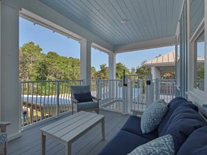 2nd Floor balcony with staircase to pool area