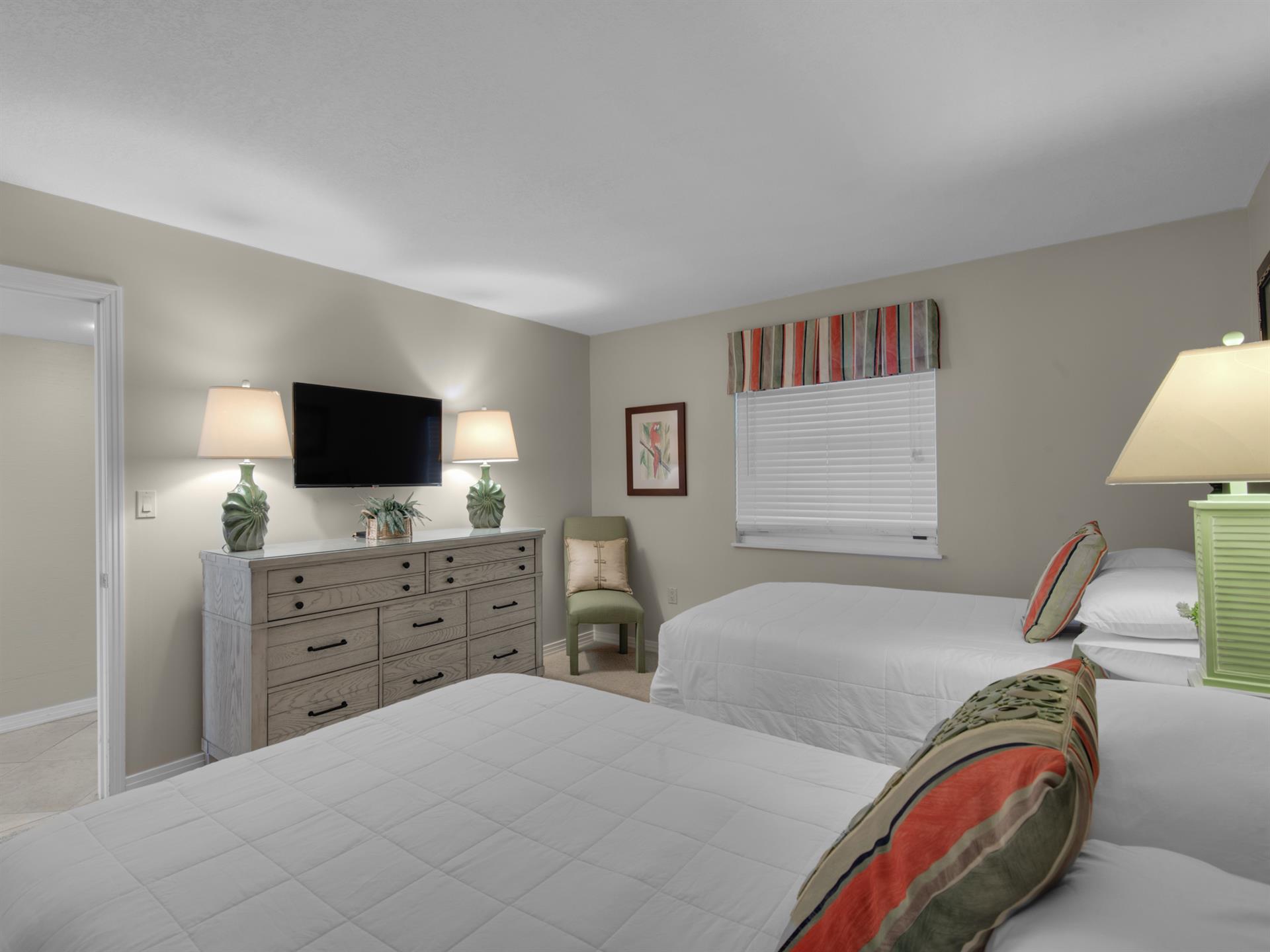 Flat Screen TV in Guest Bedroom