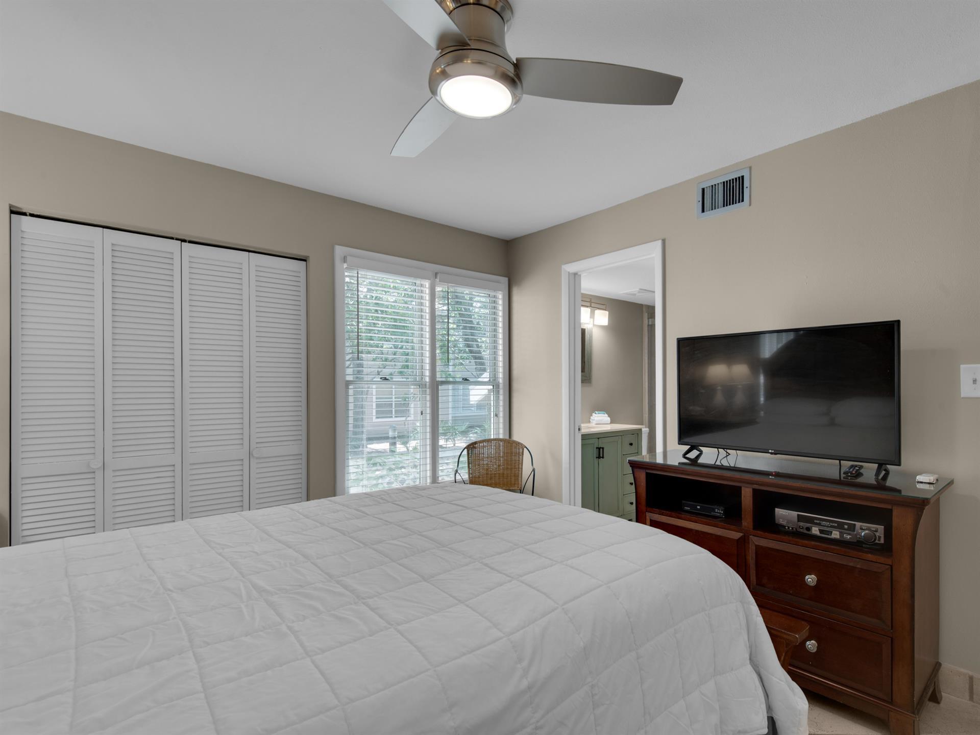 Flat Screen TV in Primary and Ensuite Bath