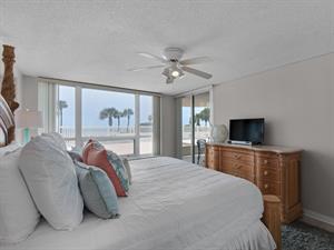 Primary Bedroom with Private Entrance to Patio and Flat Screen TV
