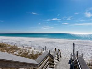 Access to the white sands and emerald waters just across from the house
