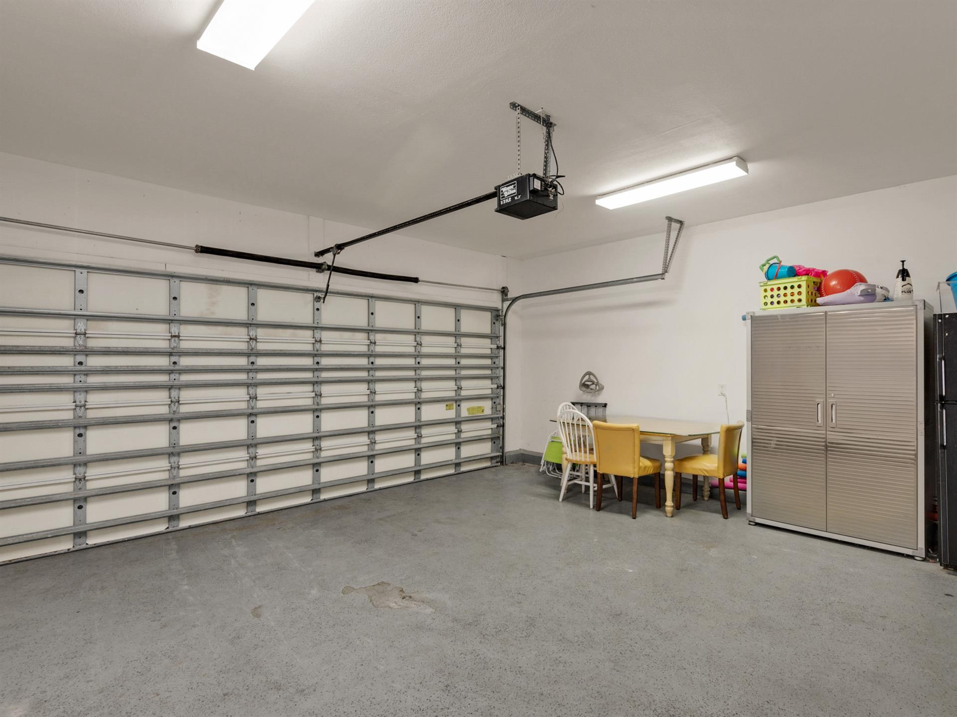 Large garage with 2nd refrigerator