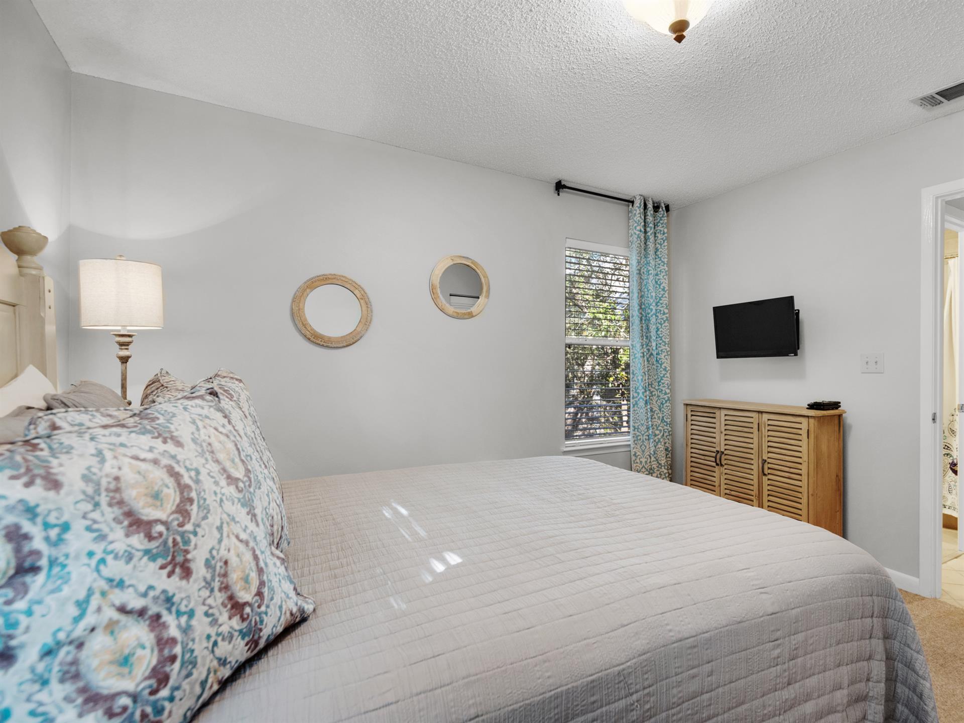 Queen Bed with Flat Screen Television