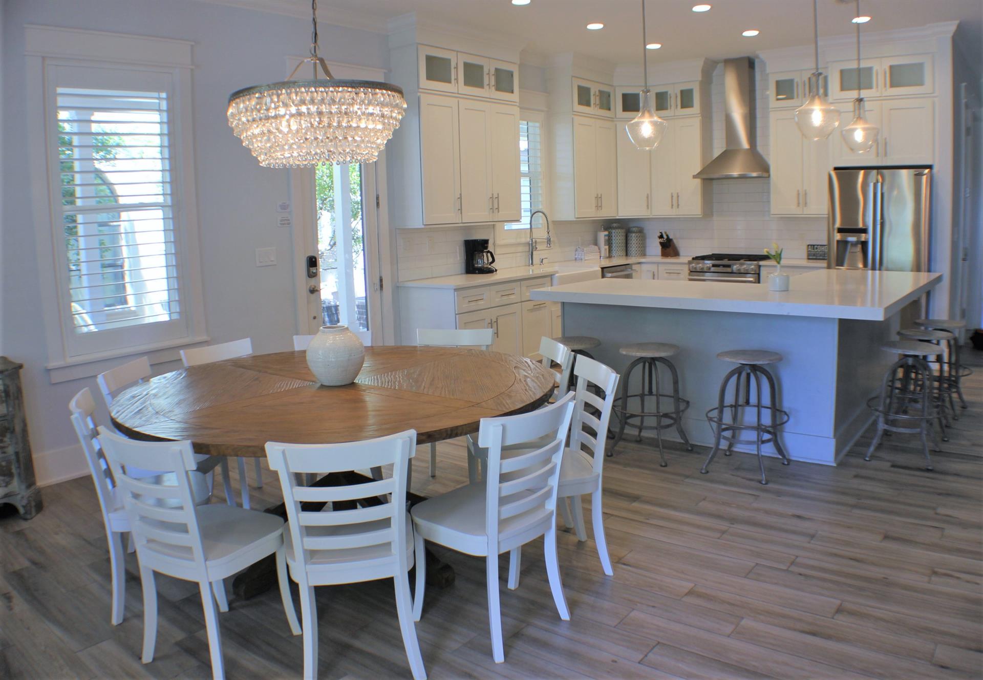 Dining area with additional seating at breakfast bar
