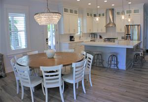 Dining area with additional seating at breakfast bar