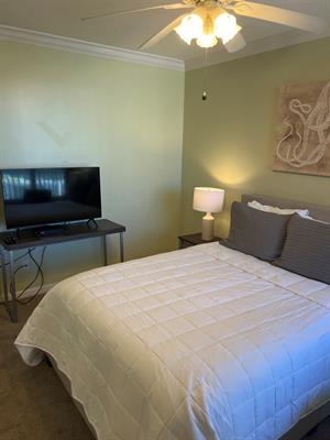 Guest Bedroom 2 with Queen Bed and Flat Screen TV