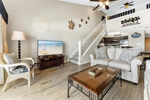 Living Room and Stairs to Loft