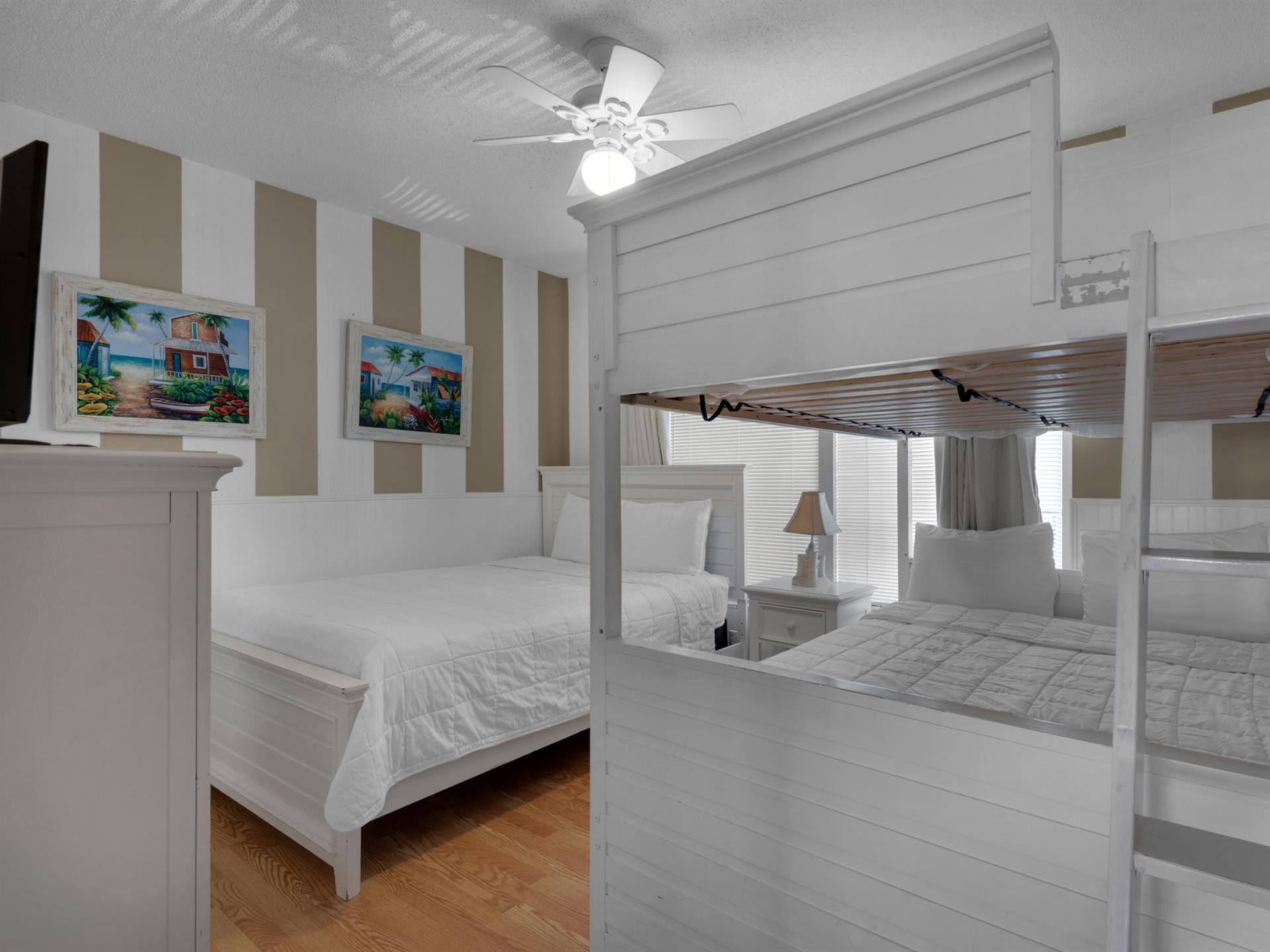 Guest Bedroom 1 with a Queen, Double Bunk Beds and Flat Screen TV