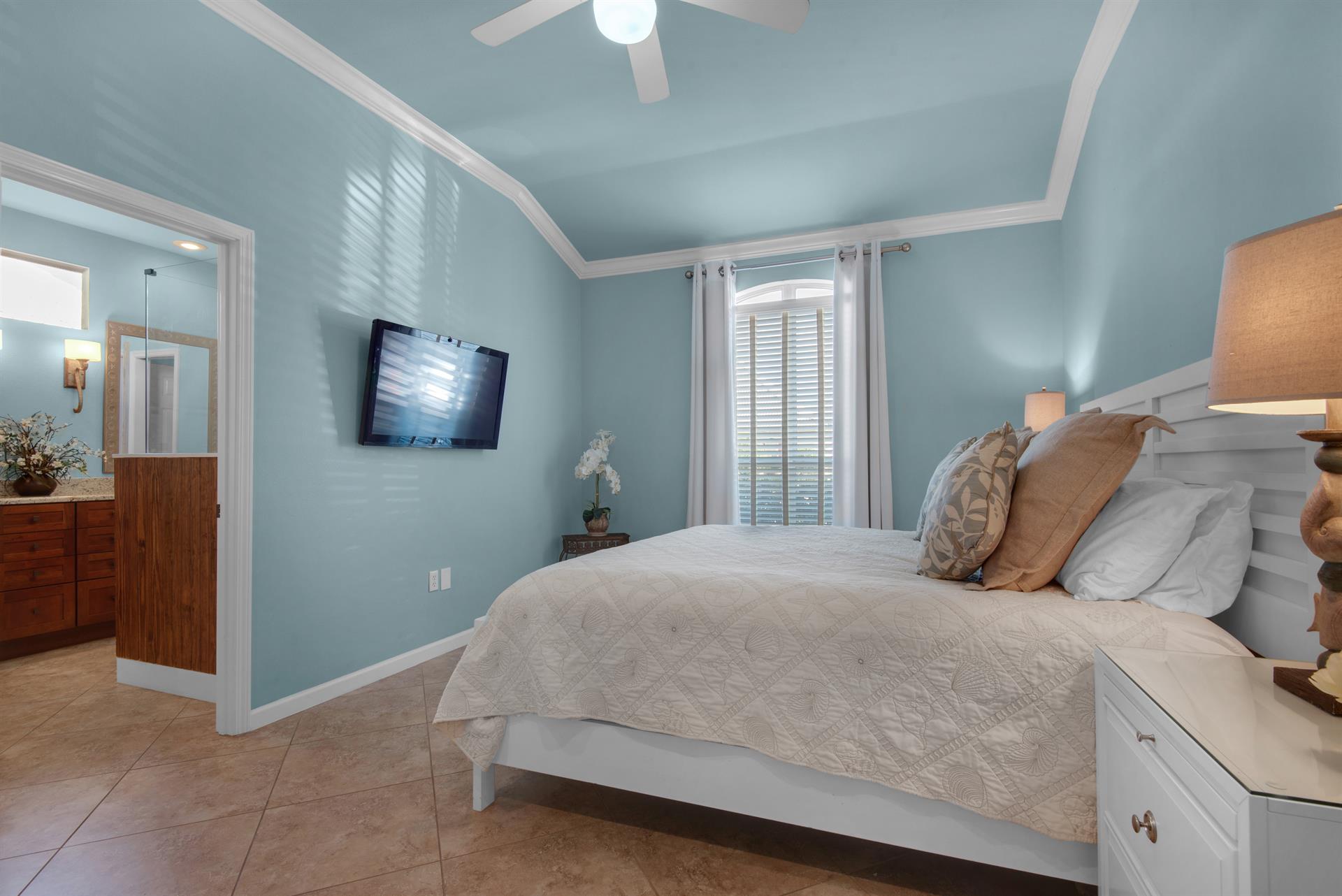 Primary Bedroom with Wall Mounted Flatscreen