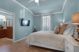Primary Bedroom with Wall Mounted Flatscreen