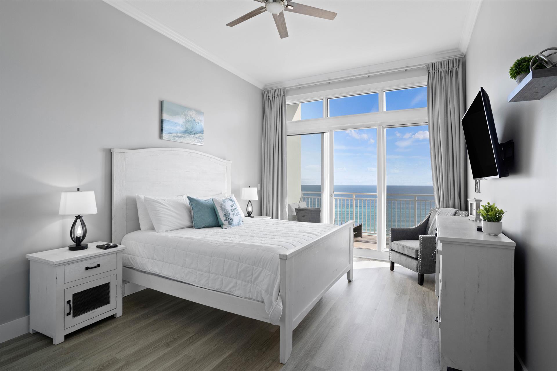 Primary Bedroom with King Bed and Private Balcony Access