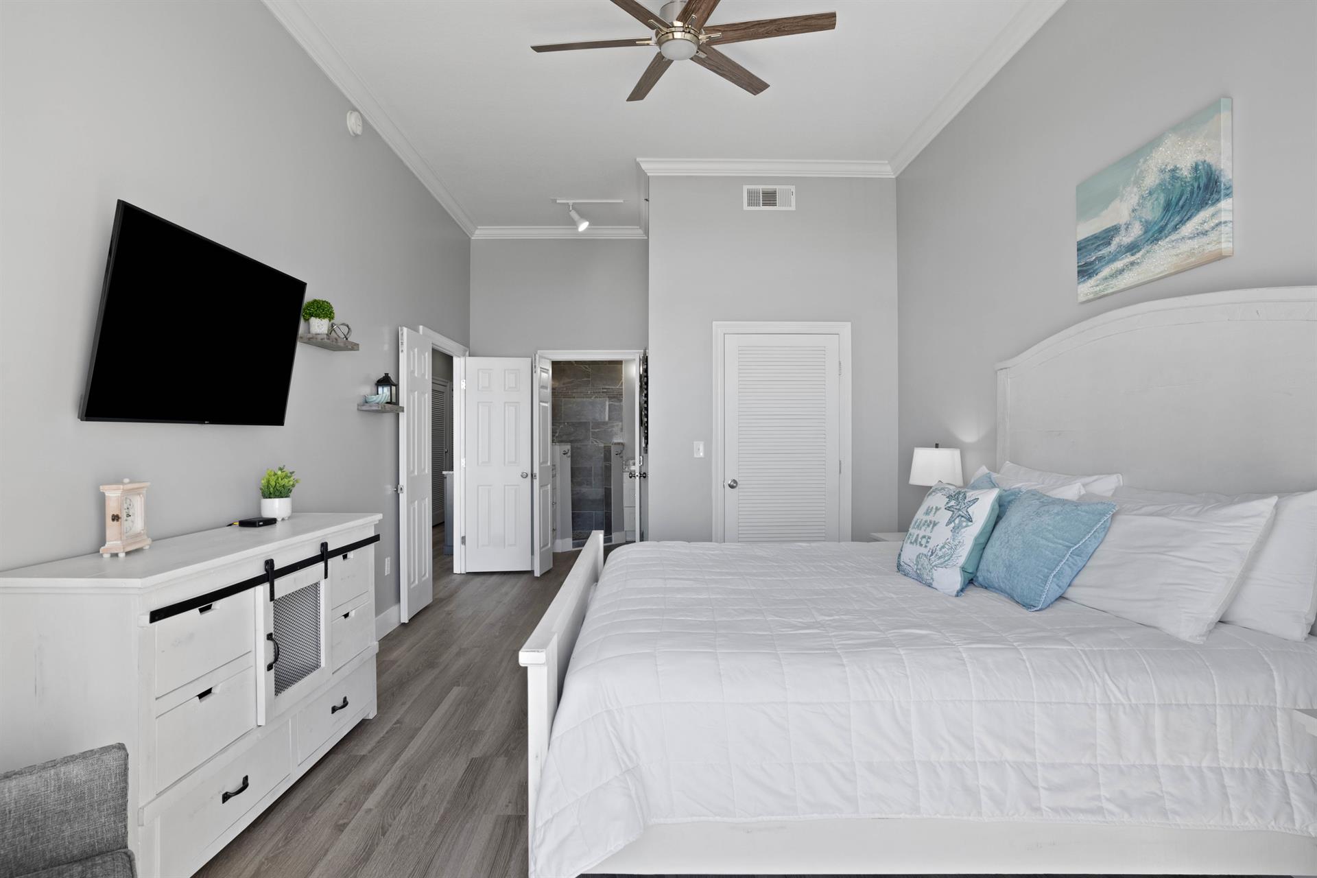 Primary Bedroom with King Bed and Flat Screen TV