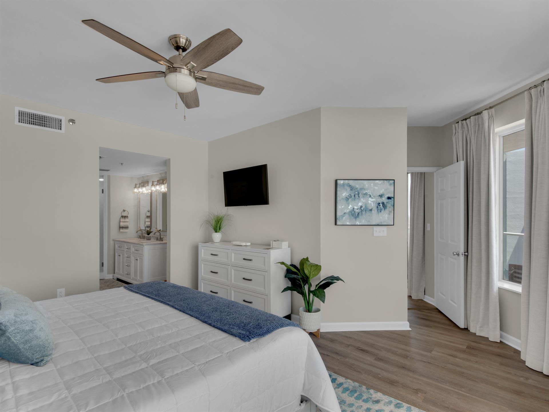 Primary Bedroom with King Bed and Flat Screen TV