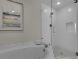 Primary Bathroom with Oversized Tub and WalkIn Shower