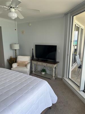 Primary Bedroom with Flat Screen TV