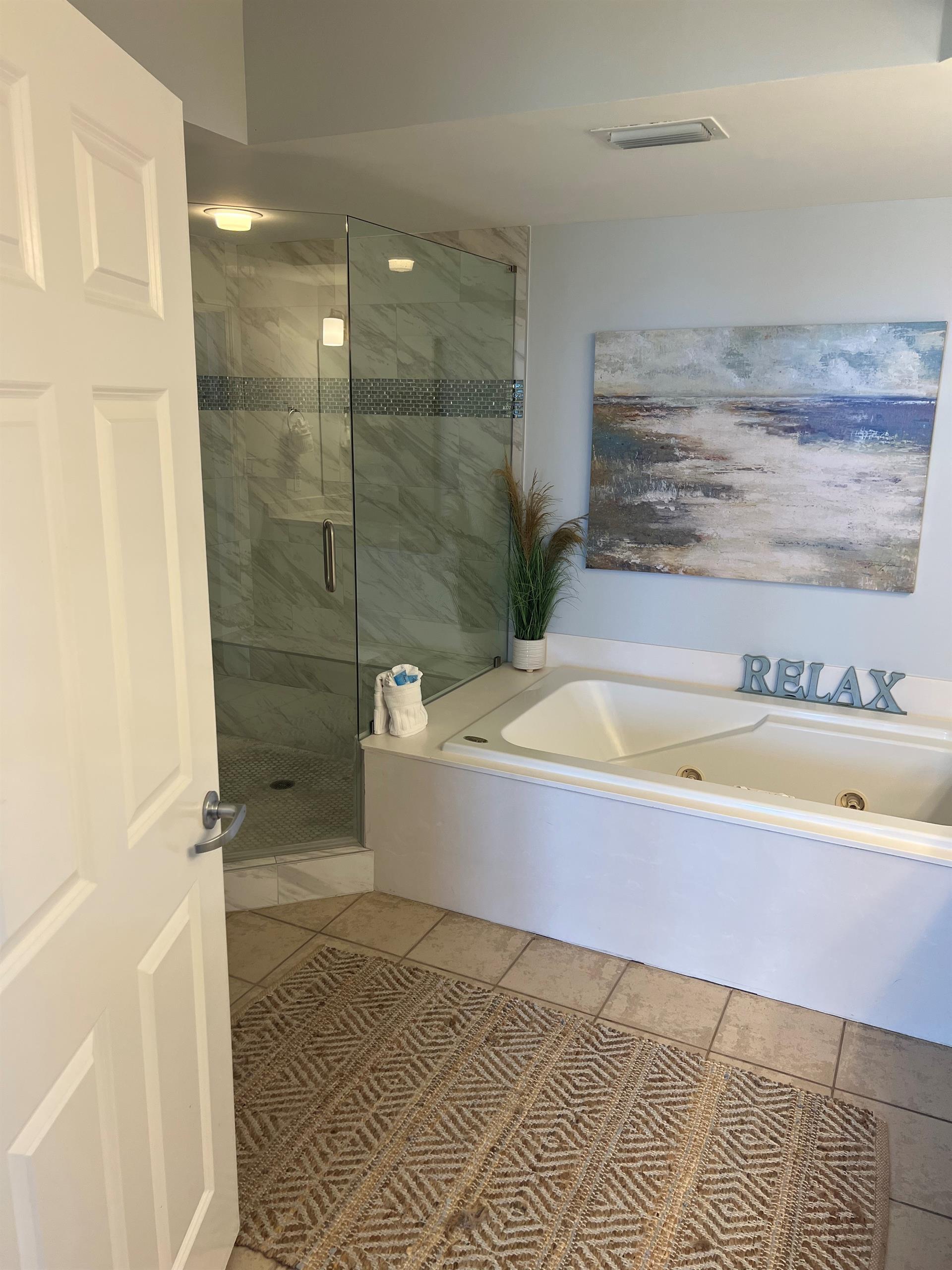 Primary Bathroom with Soaking Tub and WalkIn Shower