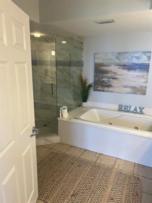 Primary Bathroom with Soaking Tub and WalkIn Shower