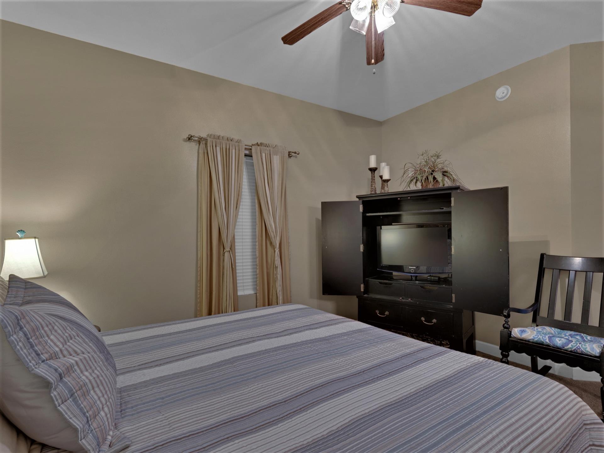 Primary Bedroom with Flat Screen TV
