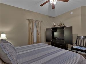 Primary Bedroom with Flat Screen TV