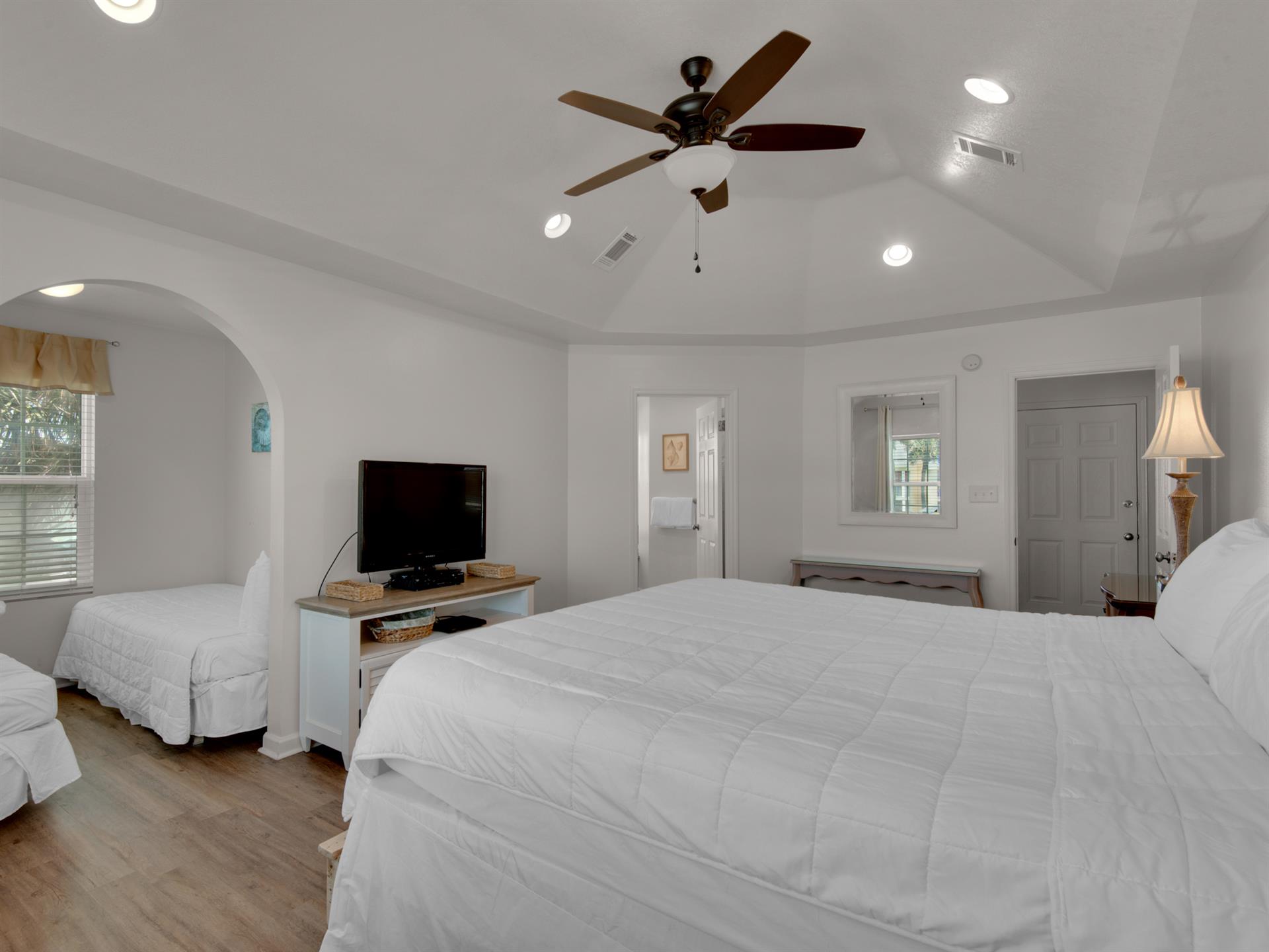 2nd floor Primary bedroom with TV and private bathroom