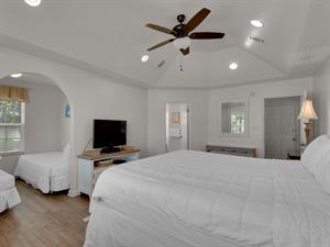 2nd floor Primary bedroom with TV and private bathroom