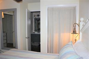 Primary bedroom with bathroom access