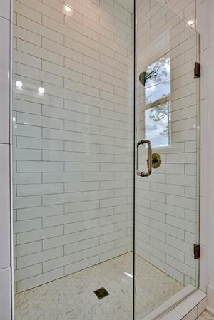 1st floor primary bathroom with walk in shower