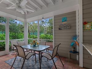 Serene Patio with View of Tennis Courts