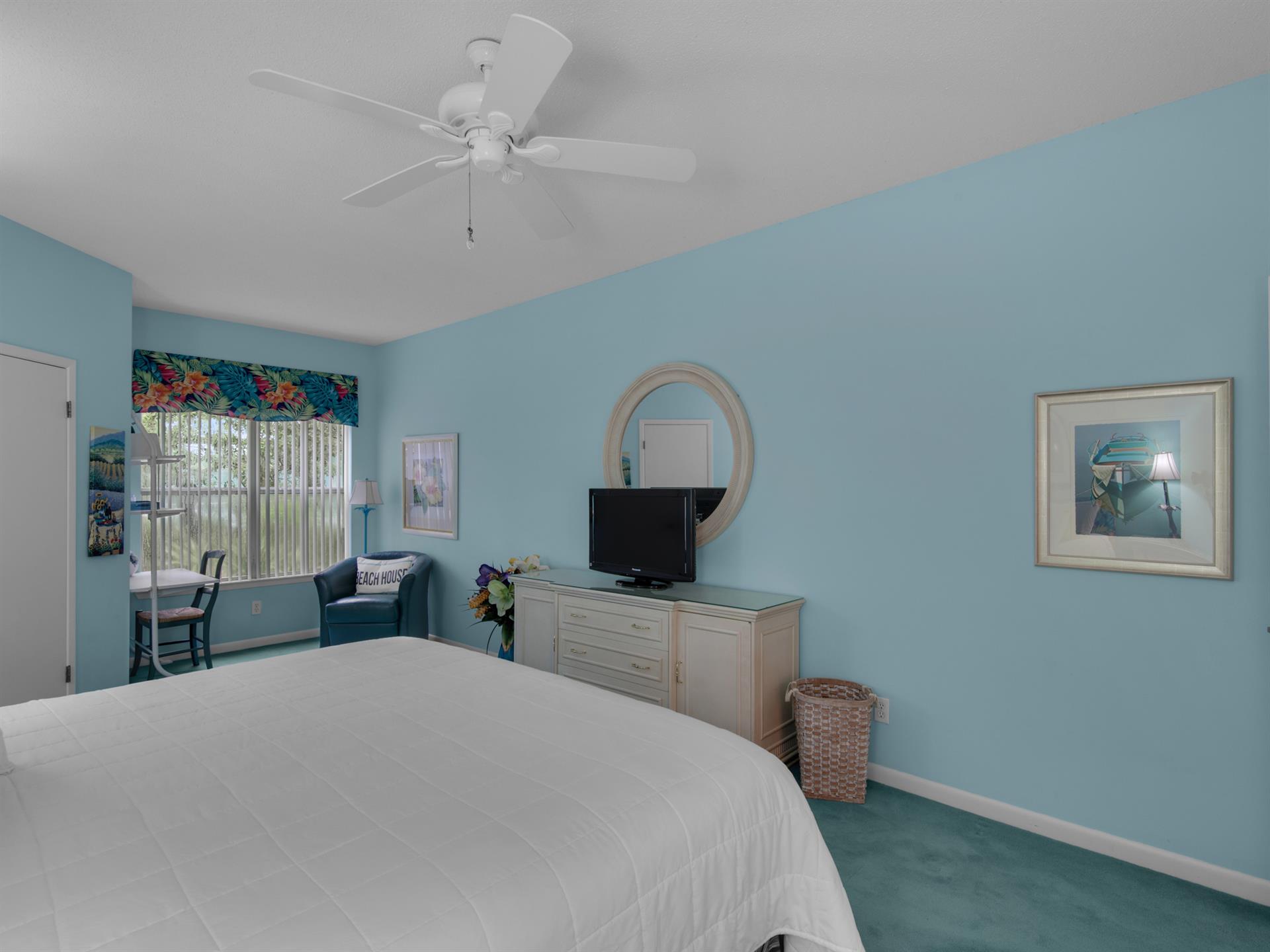 Flat Screen T.V. in Primary Bedroom