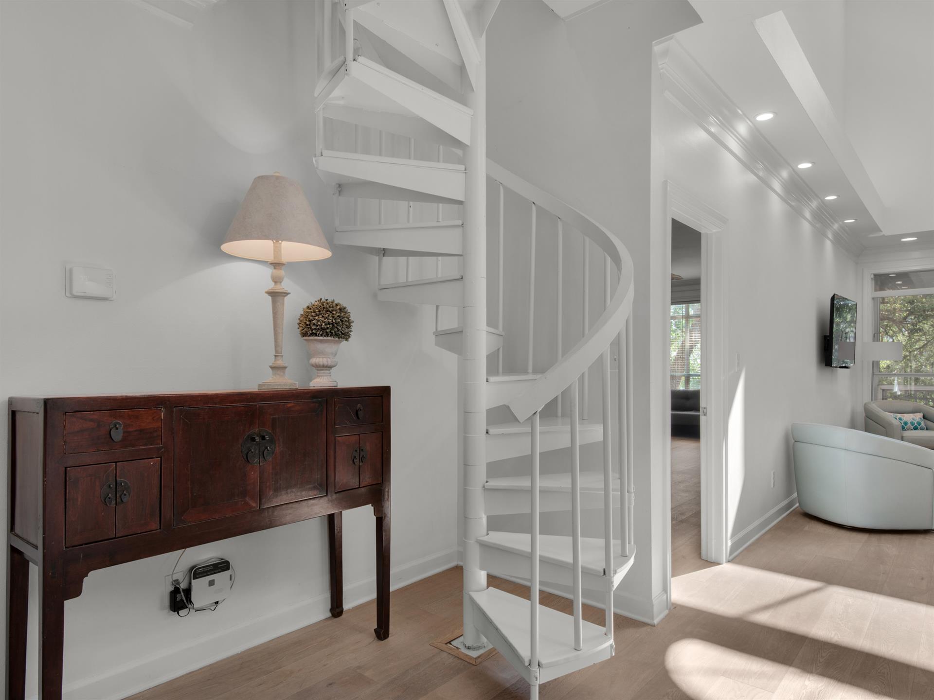 Spiral Staircase Leading up to Loft