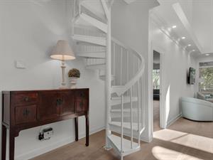 Spiral Staircase Leading up to Loft