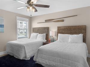 2nd floor guest bedroom with two full size beds