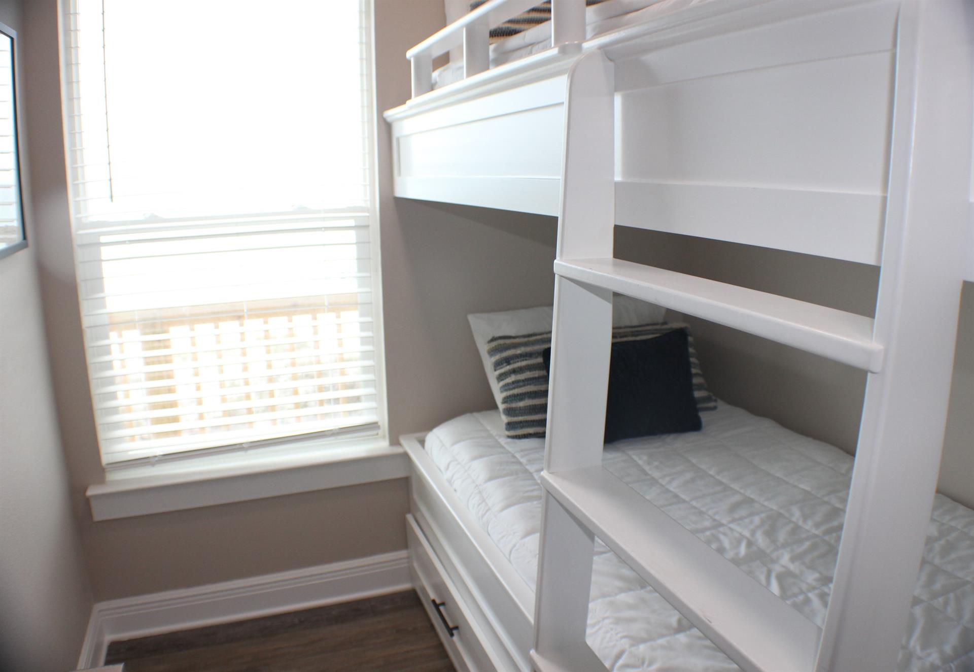 Bunk bedroom with custom bunk beds