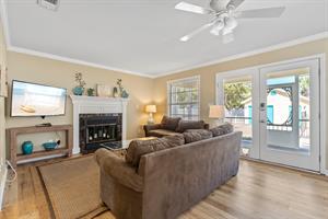 Living Room at Back of House Looking out Toward Pool