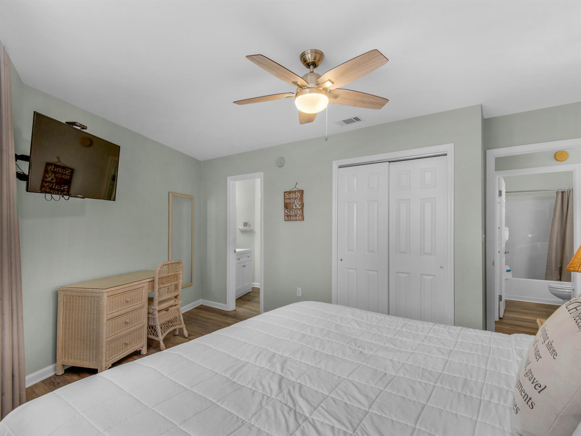 Primary Bedroom with King Bed and Flat Screen TV