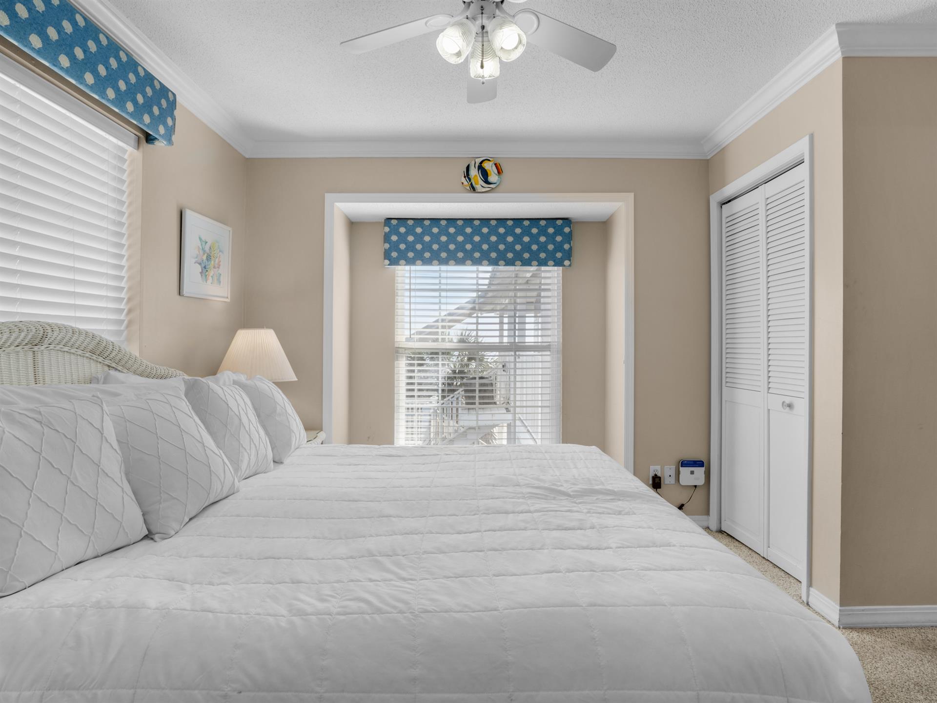 Primary bedroom with window bench seating
